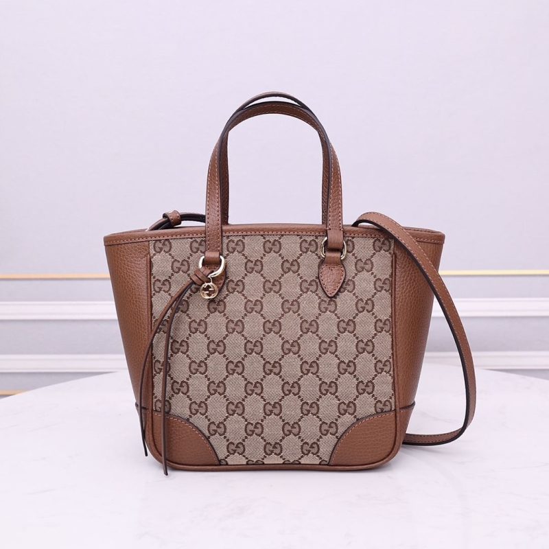 G*u*i shopping bags